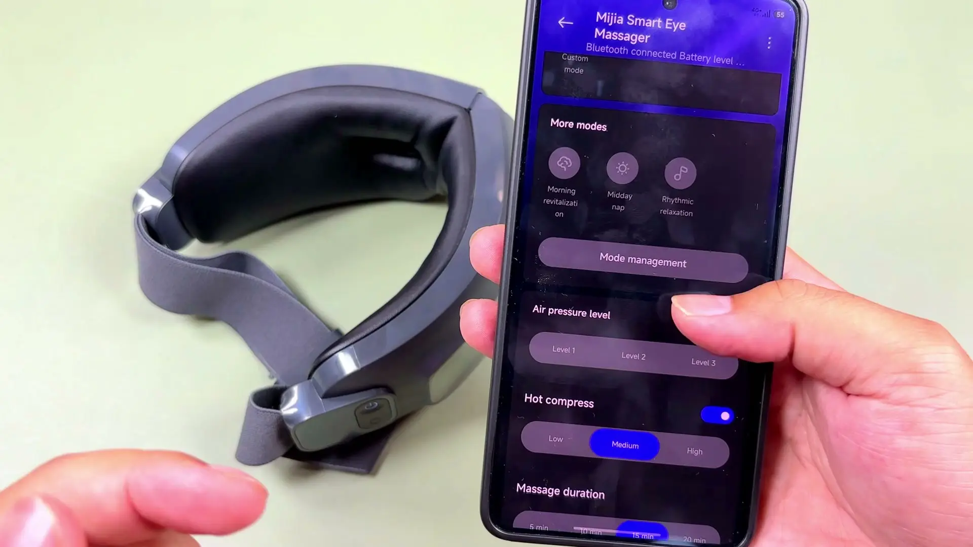 Mi Home app showing hot compress, air pressure level, and massage duration controls for the eye massager